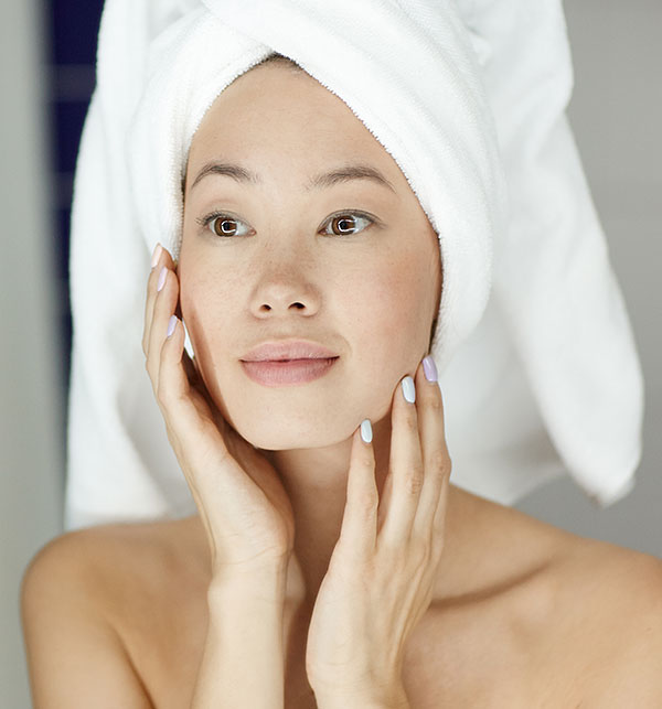 Image of an asian woman with healthy, clean skin. 